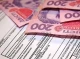 Українцям масово блокують банківські картки через борги по комуналці: подробиці